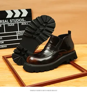 Botines Chelsea de cuero marrón oscuro de estilo británico con suola dentada
