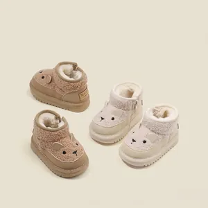Plush warm fleece baby snow boots with cute bear ears in tan and beige colors for winter