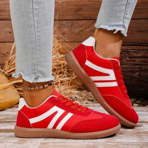 Retro red and white German Army Trainer sneakers for women with vintage gum sole