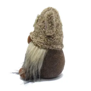 Detailed side view of dog-themed plush gnome with knitted hat and long faux fur beard