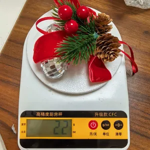 Christmas velvet bow ornament with pine cones and berries weighing 22g