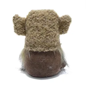 Detailed back view of a handcrafted plush dog-themed gnome doll with boucle hat