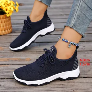 Close-up of navy blue breathable mesh walking shoes showing 4.0cm soft sole height.