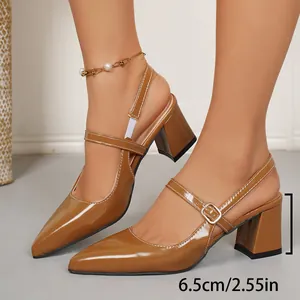 Detailed view of elegant brown pointed toe slingback sandals featuring a 6.5cm block heel