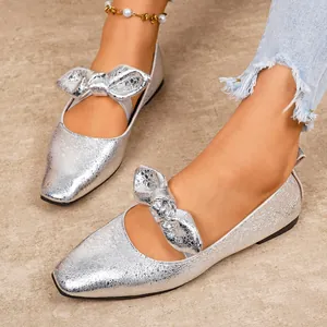 Elegant silver textured Mary Jane flats with a stylish bow decoration for daily wear