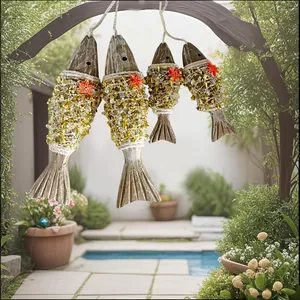 Close-up of rustic wooden fish garden hanging decor with golden beads and starfish