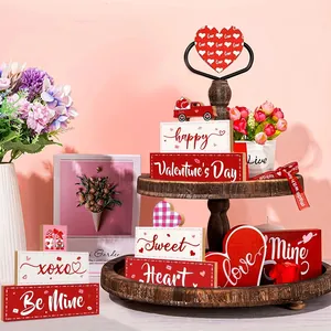 Valentine's Day wooden tiered tray decor set with romantic heart-themed signs and blocks.