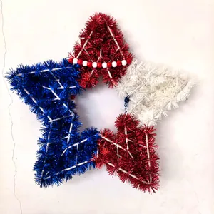 Detailed view of red white and blue tinsel star wreath with red white bead accents