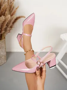 Detailed view of elegant pink pointed-toe chunky heel Mary Jane sandals for women.
