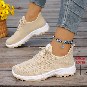 Detail of beige breathable mesh walking shoes for elderly showing 4.0cm comfortable heel height