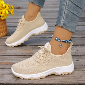 Comfortable breathable beige mesh walking sneakers with soft sole for elderly women