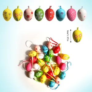 Detailed view of 4cm colorful Easter eggs with hanging ribbons and varied patterns