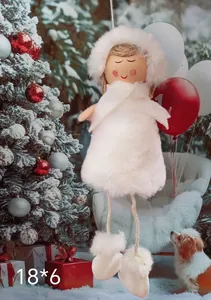 Detailed view of plush white angel girl Christmas tree hanging ornament