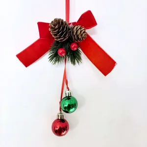 Elegant Christmas velvet red bow ornament with natural pinecones and shiny balls
