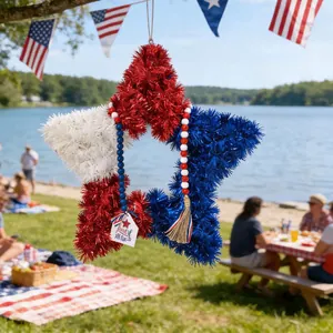 Detailed shot of July 4th tinsel star with patriotic beads and tassel decoration.