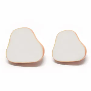 Detail view of smooth white resin doll noses for DIY gnome and Santa Claus craft projects.