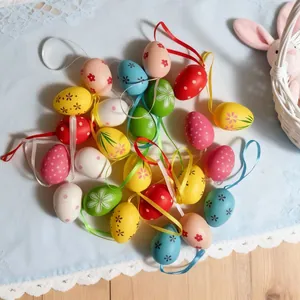 Detailed view of colorful 4cm Easter eggs with flower and dot patterns for festive decoration