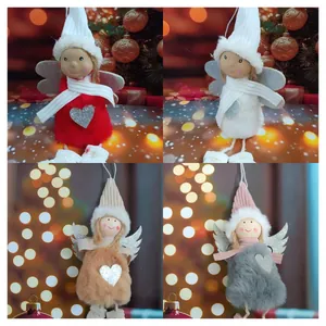 Plüsch-Weihnachtsengel-Puppen in Rot, Weiß, Braun und Grau mit glitzernden silbernen Flügeln.