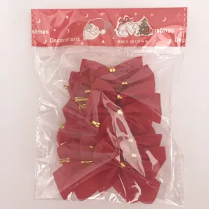 Pack of red fabric Christmas tree bow decorations with gold ties in festive packaging