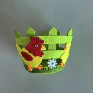 Close-up detail of Easter non-woven felt basket with cute hen and chick decorations