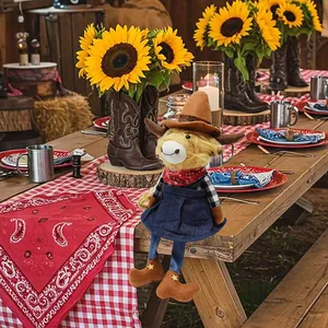 Detailed view of cowboy highland cow plush toy in a rustic western table setting