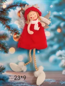 Detailed view of plush Christmas angel hanging ornament with reindeer antlers and red dress