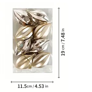 Detail of starfruit shaped champagne gold Christmas ornaments in clear box with dimensions