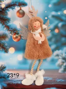 Close-up of plush Christmas angel ornament with reindeer antlers and silver wings