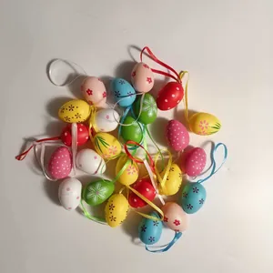 Detailed view of colorful 4cm plastic hanging Easter egg decorations with floral patterns