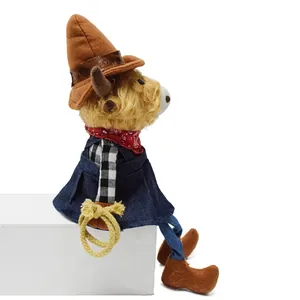 Detailed side view of a cute highland cow plush toy in cowboy outfit on white pedestal