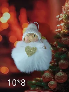 Detailed view of a cute plush angel ornament featuring a fluffy body and golden heart