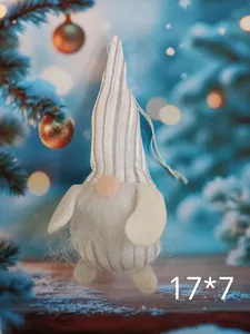 Detailed view of plush Christmas gnome ornament with silver striped hat