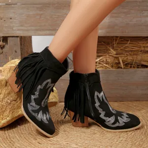 Stylish black western ankle boots featuring silver embroidery and fringe on chunky heels