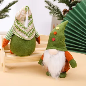 Pair of green forest Christmas gnome plush ornaments with knitted hats and white beards
