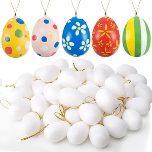White blank DIY Easter eggs with hanging strings for nursery crafts and painting