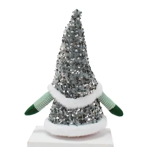 Nain de Noël de luxe à paillettes argentées avec bras verts et garniture en fourrure.