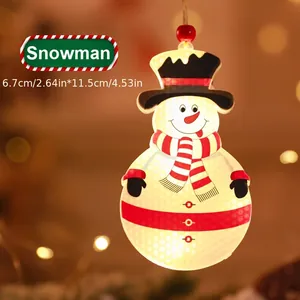 Hanging LED snowman Christmas tree ornament with warm glowing holiday light effect
