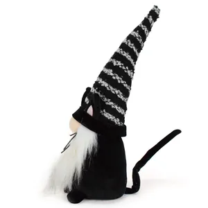 Detailed side profile of a Halloween striped black cat gnome plush decoration.