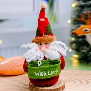 Handmade felt Santa Claus doll Christmas decoration holding a green Wish List basket