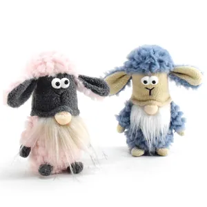 Close-up detail of cute pink and blue plush sheep gnomes for Christmas holiday home decoration