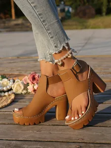 Stylish tan peep-toe platform sandals with high block heel and adjustable ankle strap