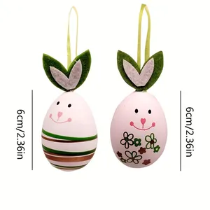 Detailansicht von zwei Osterie-Ornamenten im Hasendesign mit 6 cm Höhenmaßangaben