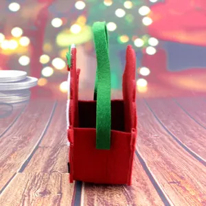 Side view of a red and green non-woven Christmas gift bag with a festive background