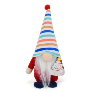 Plush birthday gnome doll with a tall striped hat holding a decorative cake accessory