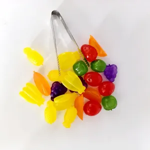Reusable colorful fruit-shaped plastic ice cubes with stainless steel tongs for drinks