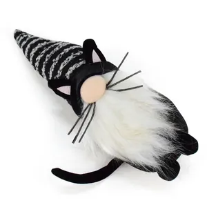 Detailed view of Halloween black cat gnome plush with striped hat and long white beard