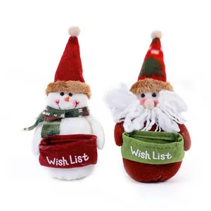 Santa Claus and snowman plush dolls holding wish list baskets for Christmas decor