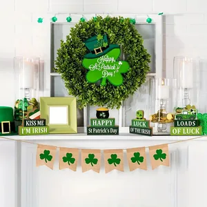 St. Patrick's Day Irish clover wooden tabletop decorations displayed on a white mantel