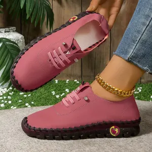 Hoogwaardige roze handgestikte leren loafers met duurzame rubberen zool voor dames