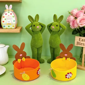 Set of colorful Easter felt bunny baskets and green flocked bunny figurines decor